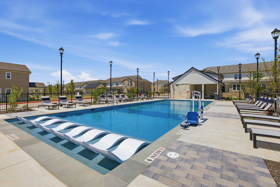 HARMON Melissa resident pool surrounded by lounge seating in Melissa, TX