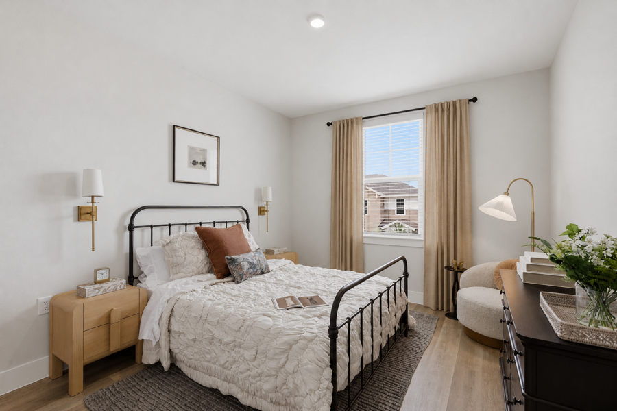 Primary bedroom with natural light in a HARMON Melissa townhome